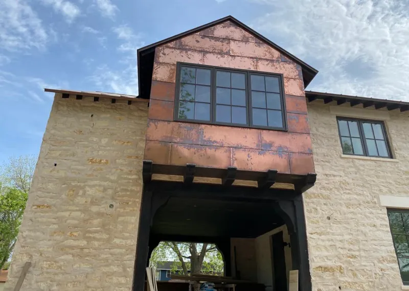 Copper metal panel facade on a stone building for Metal Roof Coating in Redondo Beach